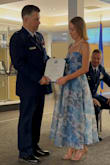 I wore this for my husband's Air Force retirement and got so many compliments! I felt so pretty and comfortable and "official" as the wife. It is slightly tight on the ribs, but I'm lacking in the bust area so anything looser would not work. - Heather G.