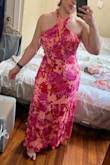 This fabric almost feels like a tablecloth or curtains, so it feels weird to be wearing it as a summer dress. Overall, I like it, but I sized down to M, so I would recommend doing that if you are between sizes. Flattering on curves - Joanna C.