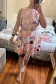I sized down from L to M because I am petite hourglass and usually between sizes. However, even the M is too big! It almost gaps a bit at the low back; the waist is much lower than it should be, and there's a lot of extra fabric on top. It's so cute. I will be trying the S, but beware of the sizing challenge if you are petite - Joanna C.