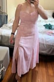 I would definitely recommend sizing down, I ordered L and it is too big everywhere. One caveat is that the chest area is already too small in L so if you have a larger bust, you might not be able to fit into it. The chest also does not have any sort of cup or support, which makes it look very strange. If you are short like me, this will be more of a maxi than midi dress, just FYI. - Joanna C.