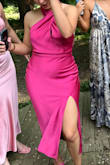 I bought this dress for an all-pink bridal party and LOVED it! It fits really well and is very flattering. The twist neck is fun and the length and slit are ideal. Would def buy again. - Rhetta E.