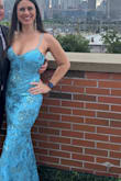 That title is what my 5 year old told me. But all kidding aside, I love this dress. The one thing, though, that I didn't realize is that it has a train.  I'm 5'8 and I had BIG shoes, and it kept getting caught when I walked.  So I had to hem it. Once hemmed, it was perfect!! Can't wait to have a reason to wear it again! - Geraldine R.