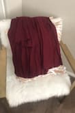 I loved this dress. I got it for my bridesmaids and tried it on and fell in love! They're not as heavy as I was expecting from the reviews but it's a very soft material. The color is super pretty. There's almost no clear picture of the dress in natural light so I was nervous to order it. - Kathryn` M.