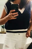 Comfortable and breathable. Hits at waistline so raising arms might reveal slight midriff. - Marie T.