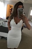 This dress is perfect. Quality fabric, not see through at all. Perfect amount of cleavage. In love. - Julia M.
