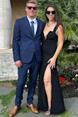 This dress delivers! It gives a beautiful silhouette, the slit is not too high keeping all the focus on the bust detail. Good thick material, better steamed than ironed (I almost burned when ironing). You won't regret it, got so many compliments! - Caroline R.
