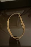 I'm in love with this choker!!! I was quite sure what I would think as I don't wear necklaces much, but this is a keep! It dresses up any outfit! It doesn't tangle! The color is beautiful! I highly recommend!!! - Catherine D.