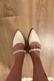 Super cute and looks great with my dress, but loose. Need to focus on walking around in it. Wouldn't change it though - Melissa G.
