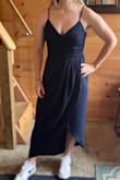 Very comfortable. I wore this as a guest to a casual wedding event. Fit excellent for me as a small in every area but breasts. I wore a strapless pushup, so it fit great, but without that bra, the top would have been too loose (I'm a 34B). - Jen M.