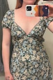 This dress felt lovely, and the bottom half fit great, but I did have the issue some folks had with extra fabric on the chest area that stuck out quite awkwardly. Also, even with the back straps tied, the siding under the bust stuck out to the side as well. I have a small chest so that probably didn't help. Anyway, super bummed it didn't work out! Otherwise, the dress is beautiful. The slide sits is just the right length, and the skirt is so pretty. - Elsa H.