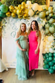 I ordered this dress for my baby shower & couldn't be more satisfied with how it turned out! I sized up & it fit perfectly (even while 6 months pregnant with twins!) I'm 5'7 and wore flats that day but it was still fairly long. I love the material and how well-made it is. The sleeves and ruffles were some of my favorite parts as well as the color. Lots of compliments. Definitely worth the money! - Heather K.