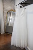 This dress is absolutely GORGEOUS! I loved so much for my wedding. The front is a little bit too open for the occasion, but I would not change it! It's really beautiful, the fabric and the fitting is amazing. 100% recommended! - Zarahys Z.