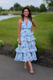 The frills are fun and bouncy, and the band around the back is stretchy. Ordered a M and it was a touch big, requiring some alteration to make it tighter (am a size 4-6). No bra required! - Megha C.
