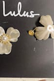 Earrings arrived in shipping box damaged. The posts were bent and the flower part on one earring was separating from the post hardware. You could see the adhesive spots where the flower was peeling off. I'm sure a hot glue gun could fix this, but I will be 100% returning. I expected better quality. I'm disappointed as I will be going out of town and will not have time to order a new or an alternative for my event. - Rachelle C.