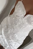 I already like the dress online but when I received it, it was even more beautiful! The details are « chef kiss »! - Joanie B.