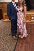 Loved the color and the high-low.  I have a smaller bust, so it was slightly baggy in the front, so I couldn't go braless.  need to get it altered, but the straps were adjustable, so it made it work. - Kim K.