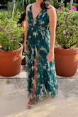 Absolutely loved this dress! Wore it to a summer wedding in Mexico and felt fabulous! It got maaaaany compliments, and my cousin liked it so much she borrowed it to wear to another wedding.
My only cons were that I had to have it hemmed as it was too long, and I was stepping on it even with heels, and it did not fit as well over my small chest. When I sat down, the cups would fold out a bit and look unflattering. I should have had this altered. Also, the color is a bit darker and more contrasty in person compared to the model photo, but this wasn't too big of a deal.
Overall, a stunner! But expect to need to take it in for alterations if you're on the small/petite side. - Kayla G.