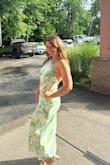 This dress was a big hit! It was slightly big/wide near my chest that I had it taken in half an inch. The fabric is delicate but it was breathable and easy to dance in. Definitely recommend! - Jessica D.