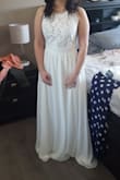 I was so excited when I tried this dress on. It's beautiful and perfect for my intimate outdoor wedding. I love the top and the bottom section falls beautifully. I will have to get mine altered, it's a little too long. - Stephanie F.