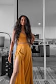 The outfit was true to size and looks very flattering. I got the yellow color, and I love how flowy it looks. The slits on the side do open up quite a bit but you could use a safety pin to hold it in place. The two things I didn't like were that it's see through - you can clearly see panty lines, and the material crushes easily. - Amrita S.