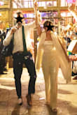Great reception jumpsuit, it stayed up amazingly well - never once had to adjust it. Got so many compliments, love all the photos. Only downside would be it is very snug on the lower belly area and doesn't work with shape wear so just be sure that's a part of the body you want on display! - Isabel` H.