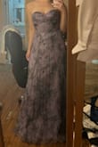 I'm loving the dress. It's made out of organza, which I love. It's a bit darker than the reference pic, but the color is cute - CINTHYA O.