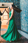 The dress is gorgeous. I put it on and it fit perfectly. I wore it for my engagements pictures and I got SO many compliments. Also, I love how flowy the dress is. Get it you will love it! - Daniela R.