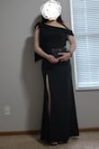 Nice black dress that I imagine would be a good choice for a black tie occasion. It makes you feel very elegant and womanly. The bow on the shoulder is very fragile and fell off after 1 try but honestly it might look better without it (you can decide for yourself in 1 of my photos)? I just used a safety pin to pin it back and was able to readjust the bow's location to where I wanted it. The dress is made from a nice stretchy material that will highlight your body contour. You'll want to wear it with high heels because of the hem line. You will probably need a bra or nipple cover underneath. Size wise, I'm usually a 8 or 10 (M) with a rectangular body shape and here I'm wearing a L. Probably would have been OK with an M, but I'm not as confident about my waistline and didn't want my bust contour to show. - Anonymous 8.