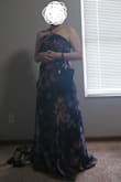 This is my favorite purchase from Lulus! It's a bit of a struggle to put on because it is definitely small, especially on the waist. I'm usually a 8 or 10 (M), and I ordered a L and it was still pretty snug. The hook on the back broke after 1 try and I had to sew it back on. But I love the print, it feels like I'm wrapped by a piece of artwork, like a Monet piece if I dare say. The actual color is much less vibrant than on the website photos, but I think that makes it look more sophisticated. I also love the bow on the back- that style gives me Japanese yukata vibes! Perfect for a summer or spring occasion. Depending on your fit/torso length the front may make your bust area appear saggy but I thought it turned out OK for me when I tried to shorten the straps, which are thankfully adjustable. Planning to wear this to as a late summer wedding guest! Hem line is on the longer side, so high heels and/or alterations would be recommended. Very happy I took a chance with this one! - Anonymous 8.