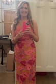 Material was great quality and vibrant in color. Loved that the strapless chest has a sticky band to keep dress in place. No strapless bra was needed. I received lots a comments on how pretty the dress was! - Beth S.