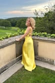 I wore this to a formal wedding with a castle as the venue (Taylor Swift used it for her Love Story music video)  So many guests came up to me saying "that's the dress from that movie How to Lose a Guy!!"  I received countless  compliments all night!  Absolute show stopper!  Btw-had prior approval from the bride- she didn't want guests wearing black instead lots of color--well this fit that request! - Ally F.