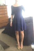 This dress is perfect to wear to a wedding or event when it's a little chilly out! I love the scallop detail around the neckline, it adds sophistication. The dress does have an invisible zipper on the side, but I never have to unzip it. The fabric is stretchy so it's easy to get on and off without the zipper. The length hits me a couple inches above the knee, which I think is so cute and flirty. I wore this to a wedding and got so many compliments on it! - Lauren C.