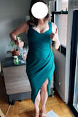 Purchased this dress for a summer wedding where all guests have to wear green. The material is thick and the waist and bottom are bodycon style. The bottom fits much like a pencil skirt. I have wide hips and imagine that I would be pulling this down all night, the slit was a bit too high for my liking. Had to return. - Kelly F.