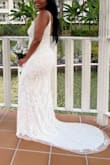 The dress was really beautiful. It has enough stretch for my bigger hips. Fit was perfect received lots of compliments. - Khadija T.