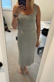 The material isn't too tight and the dress fits great and looks just as pictured. - Emily C.