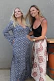 Love this dress. I wore it for my baby shower and it was super comfortable. A little low cut in the top and the slits were a little high on the sides (2 slits). I would recommend sizing down. - Madeline K.