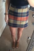Probably won't wear this til fall but still a super cute skirt! A little bit tight but still fits well. Material is very soft and flattering. - Chelsea H.