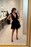 This dress was for a wedding in South Texas (read: fancy and hot AF). It did GREAT all day/night. It was so easy to put on after hair/makeup. It was so cute and looked great in photos. I felt so dressed up with minimal effort - just got a cute pair of bow earrings and black heels. I got a ton of compliments at the wedding and from friends and family from pictures! The small black beads on the dress give it movement, but a few of them did fall off. It didn't bother me at all because there's tons of them all over. I definitely recommend this dress for a special event. - Daniela D.