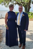 This is really a beautiful fitting dress and the color is great. I wore this for my son's wedding. It shows curves while not hugging the body too tightly. The material is very comfortable and a bit stretchy, perfect for any occasion. The length was perfect for me with 3 inch heals. It fell longer on me than the ankle length in the picture which I liked. I love the way the top is cut with the higher neck. I received so many complements.  I would have given this dress a 5 except for the zipper. It is really hard to zip, on or off. I was prepared to sew myself in just in case it broke the day of the wedding. It almost didn't zip then it did. It just seems like a cheap zipper.  I love the dress, though, and may find a good seamstress that can replace the zipper so I can wear it again and not worry about breakage. If you buy, take a sewing kit and a friend to help with you to your event just in case. - Cathy W.