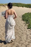 It was perfect for my beach wedding! Everyone was complimenting my dress. Looked soooo beautiful. Fitted perfectly. Color was soo pretty for wedding on beach (looked more natural, didnt look too bright white). Flower details were shining on photos. Skirt was just perfect. Not too long not too short. But perfect for windy beach wedding. It was blowing on the wind. Oh and I didnt wear high heels since I was doing the wedding on sand so keep in mind that if you wear it with high heels, the length is gonna be shorter. - Tumenjargal S.