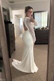 The dress is absolutely gorgeous. It fit perfectly in all the right places. Will need to get altered on the sides around the open back section, but that's ok! Seriously can't wait to get married just to put it on again! - Laurelis M.
