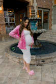 Love love love this dress. Loved it so much that I wore it for my baby shower when I was pregnant with my 2nd son & then again when I was pregnant with my daughter. I purchased a size Medium & which is my normal a size. It is snug fitted which I like. Then has room for extra. It's not a baby shower dress. But it worked for me! - Tianna M.