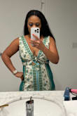 The dress is super cute; however, it is short! I didn't realize it until I went to sit down at a restaurant. Also, the top area loosens a bit even when you tie it tightly. Overall, still a cute dress. I also have it in red. - Shani M.