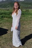 I loved this dress the first time I saw it. It shipped in 3 days!! For me, it ran a little longer in the front, so I did have it tailored so I wasn't stepping on it. It's heavy due to the beading, but not uncomfortable. It hangs on your body so well, and it's stretchy. It was so comfortable to wear. I got in and out of a car easily. The beading at the bottom is very delicate; I did end up losing a bit to snags. Otherwise, I loved this dress so much! - Raushanna C.