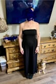 Ordered this May 23rd and it never came. I ended up ordering again, and this time it was delivered and I'm so happy with it. It feels like flowy bathing suit material imo. It's very light and airy! Very stretchy and forgiving so buyyy it! The top part stays put and I'm average chest size. It's very flattering. I'm almost 5'8 and it pretty much hits at the ankle to my ankle. Now all I need is a tan! - Jennifer H.