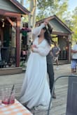 This dress was perfect for our elopement. Only made a small alteration on the sleeves to fit my wrists better. Other than that, it fit perfectly. - Emma W.