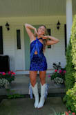The prettiest dress! I wore it to a Megan Moroney concert, standing/sitting in line for hours, dancing, and sweating all night, but it was extremely comfortable. A couple sequins fell off, but nothing that was noticeable. I liked it enough to order, but truly fell in love with it once it was on. Worth every penny. - Alayna O.