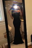 It's such a beautiful dress, not too showy, but I love the off the shoulder look! The lace shoulders make it a little difficult to move, but it works out. I am 5"3' so it is a little long on me even with 4 inch heels, but that is easy to get altered. It fits true to size; I ordered an XS because I am quite petite, although it could be a little tighter around the waist and thigh area. In the picture, it has been pulled in and altered a bit to fit better. Gorgeous dress overall, I am so excited to wear it to prom! - Tatiana F.