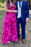 I felt so beautiful in this dress! I had many compliments, and the vibrant color of this dress was off the charts! Little tight in the chest area but still very comfortable - Abigail C.