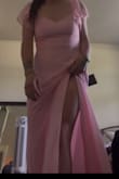 It fit perfectly. The bust was a little loose (because I wear a small cup), but the ties in the back made it fit snug. If you're wearing heels to the event, it would fit perfectly. Unfortunately, the wedding I'm attending is going to be in an orchard so I cannot wear heels. We will be getting my dress tailored because it's very long. Tall girls can buy the dress and fit into it well! It's very bright; my house just has poor lighting. Thank you LULUS - Kendra P.